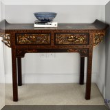 F61. Chinoiserie 2-drawer console table. 32”h x 44”w x 15”d 